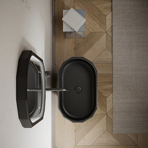 Black and white freestanding pedestal sink with architectural diamond-cut facets