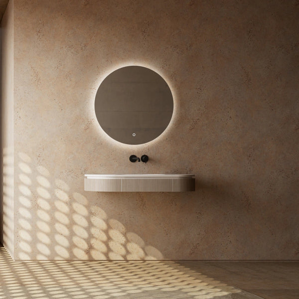 Contemporary wall-mounted bathroom basin with fluted front design and solid surface finish