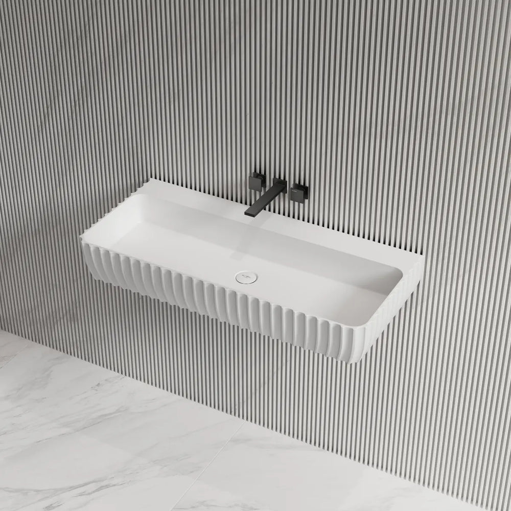 White fluted solid surface wall mount bathroom sink with rectangular basin