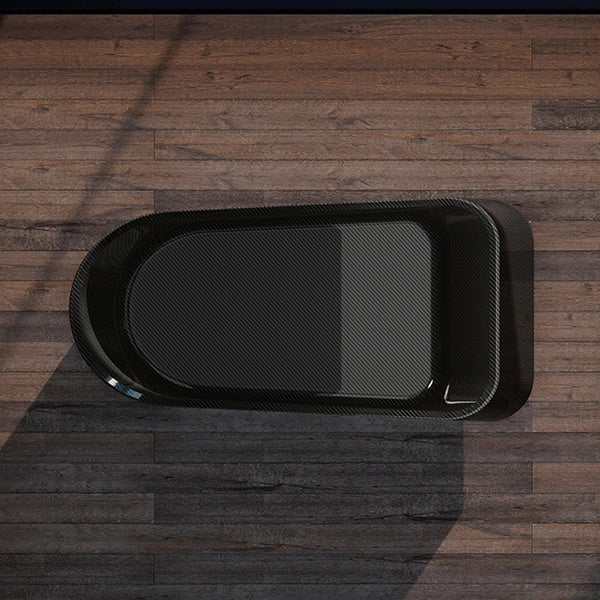 Modern freestanding bathtub featuring unique marbled forged carbon fiber texture and nautical curves