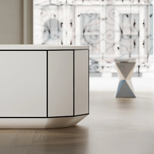 Luxury BERYL Series freestanding tub with black accent rim in spa-like bathroom setting
