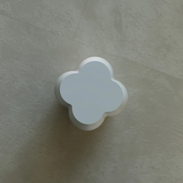 Modern solid surface shower stool beside freestanding bathtub