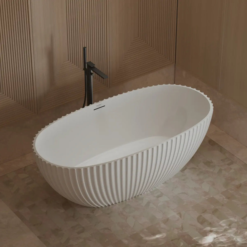 White double ended ribbed freestanding soaking bath with curved edges