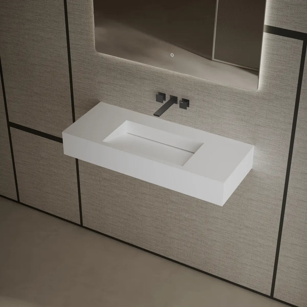 Modern matte white solid surface wall hung sink side top view close-up