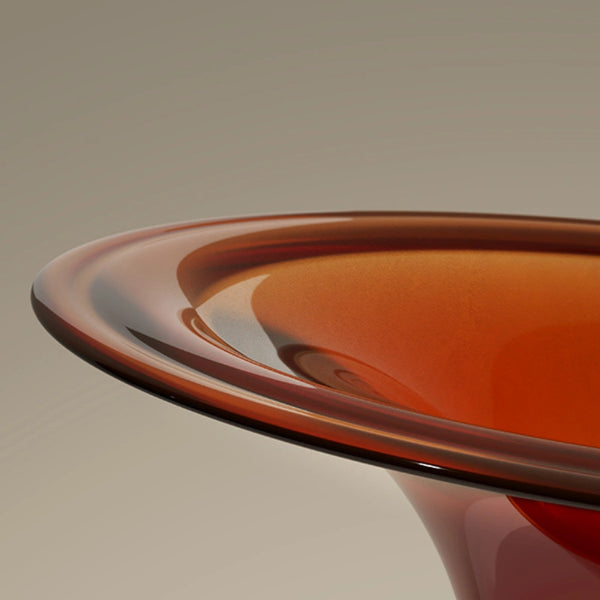 Modern minimalist freestanding soaking tub featuring a sculptural water-inspired silhouette