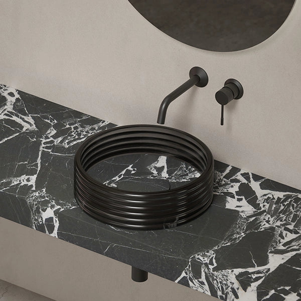 MonBlari STRATA Series black marble vessel sink with transparent acrylic