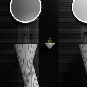 MonBlari SWING Series sculptural pedestal sink featuring a dynamic dual-cone carved design