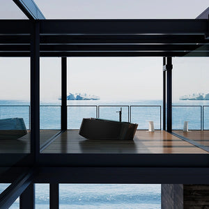 MonBlari VELA Series forged carbon fiber freestanding bathtub with aerodynamic yacht and wave-inspired silhouette
