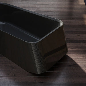 High-tech forged carbon fiber spa tub offering superior thermal retention and ocean-inspired design